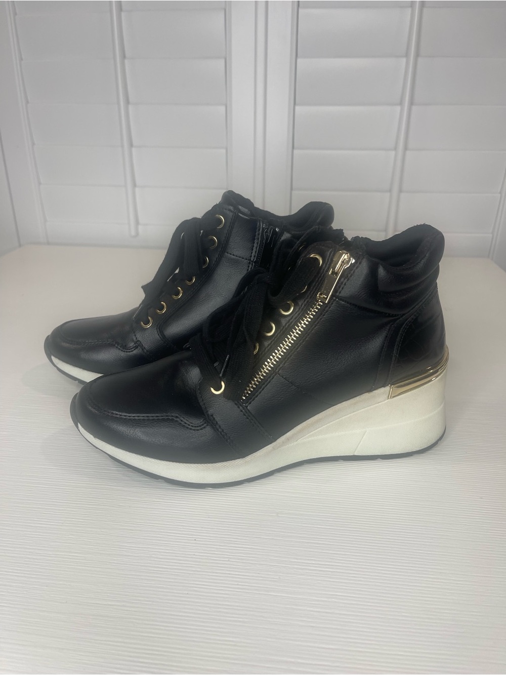 Aldo Black Wedge Sneakers with Gold Accents